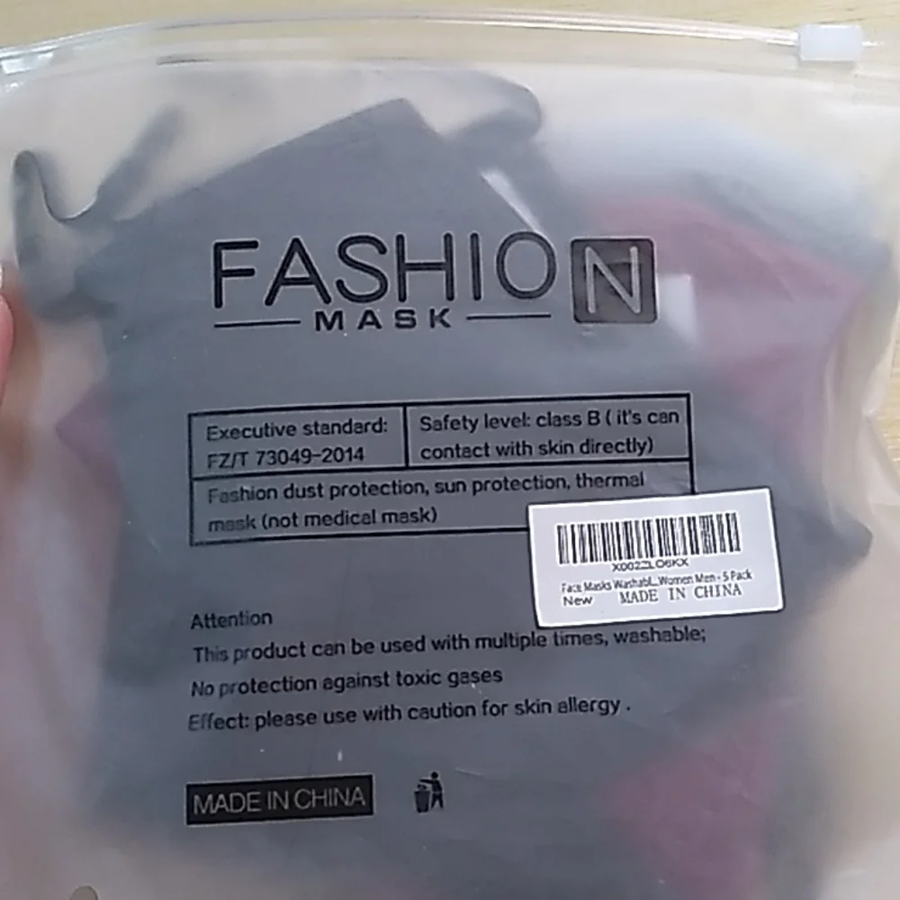 5 pack of Adult Face Masks with adjustable sides for your ears, wire in the nose